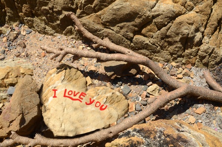 A love heart made of sand spells I love youの写真素材