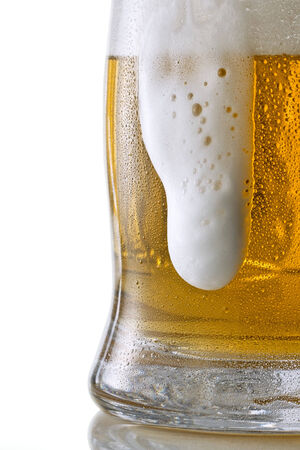 Bubbles and foam in a beerの写真素材