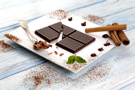Dark chocolate on white plateの写真素材