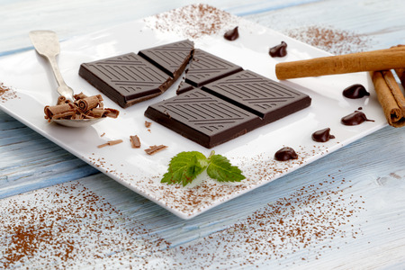 Dark chocolate on white plateの写真素材