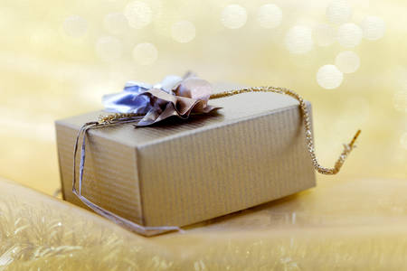 Christmas gift box on yellow backgroundの写真素材