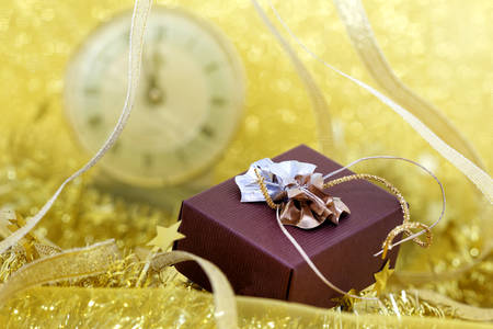 Christmas gift box on yellow background