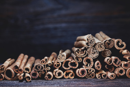 Cinnamon sticks on a wooden table