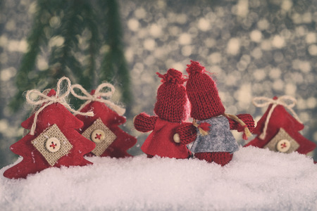 Red Christmas decorations on the abstract backgroundの写真素材