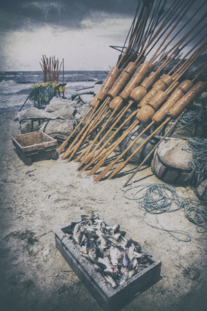 Fishing port, fishing boats on the beach, sand and seaの写真素材