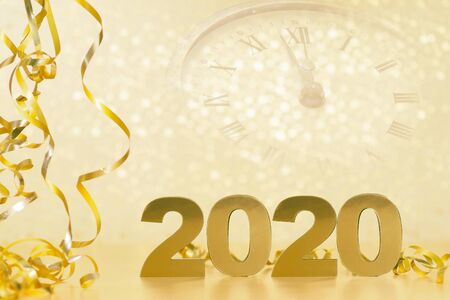 Happy New Year 2020. Symbol from number 2020 on wooden background