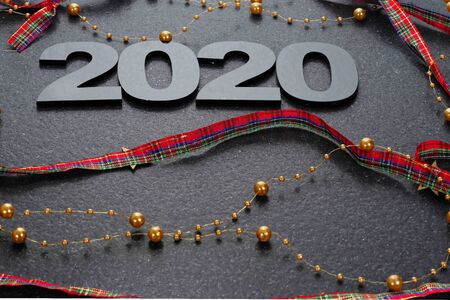 Happy New Year 2020. Symbol from number 2020 on stone background