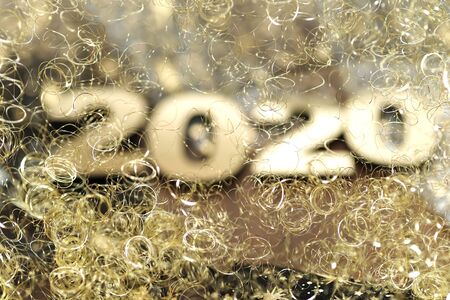 Happy New Year 2020. Symbol from number 2020 on abstract backgroundの写真素材