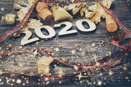 Happy New Year 2020. Symbol from number 2020 on wooden backgroundの写真素材
