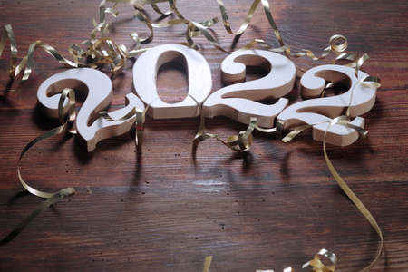 Happy New Year. Symbol from number 2022 on abstract background