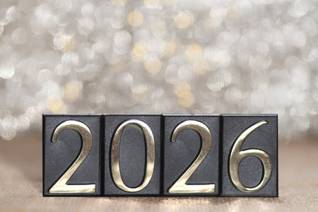 New Year 2016 concept. Black number 2016 on silver bokeh background.の写真素材