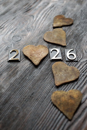 Wooden hearts on rustic wooden background.の写真素材