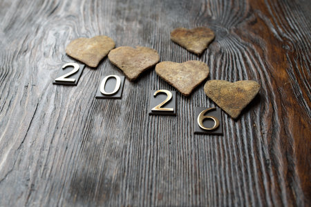 Wooden hearts on rustic wooden background.の写真素材