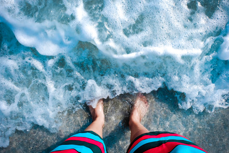 Standing on the beach