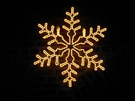 Star in front of a brick wallの写真素材