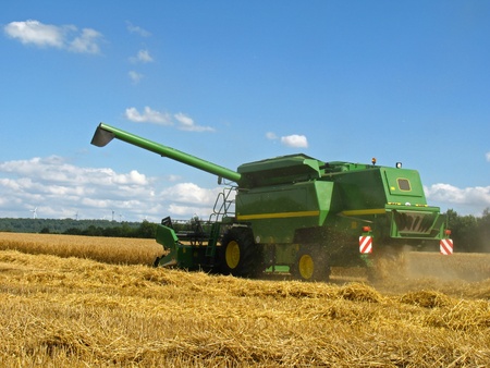 A combines loaded a trailer with cereal