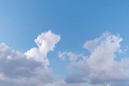 Shapes in the blue sky with white clouds. texture concept. nature concept.の写真素材