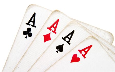hand of cards of four aces of playing cards on white background with path