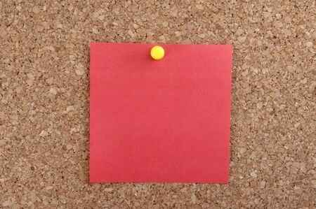 close up of red note pad reminder on wallの写真素材