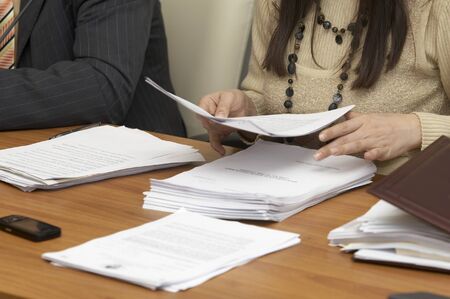 close up of conference meeting notebooks and documentsの写真素材