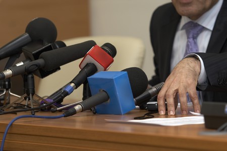 close up of conference meeting speecher gestures