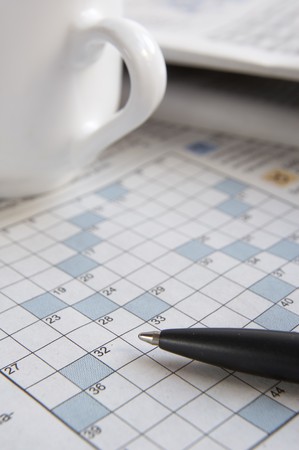 close up of empty crosswords and penの写真素材