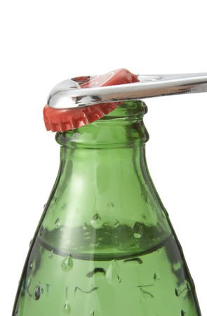 close up green bottle filled with soft drink on white backgroundの写真素材