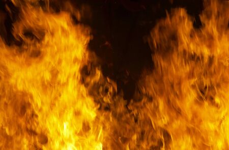 close up of fire flames forming background