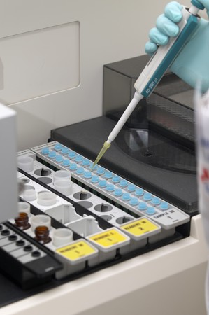 close-up of worker in lab of pharmaceutical industry