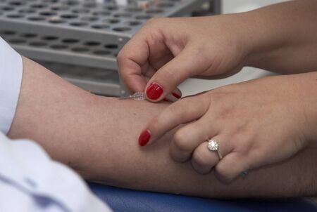 close up of blood extraction in labの写真素材