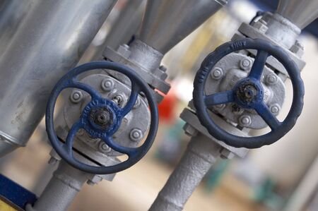 close up of industrial pipes of oil industry production