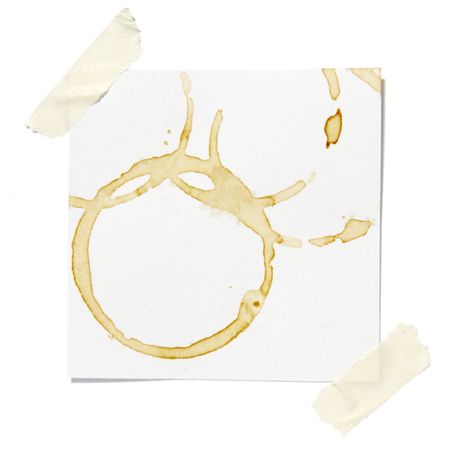 collection of reminders with coffee stain marks on white background . each one is in cameras full  resolutionの写真素材