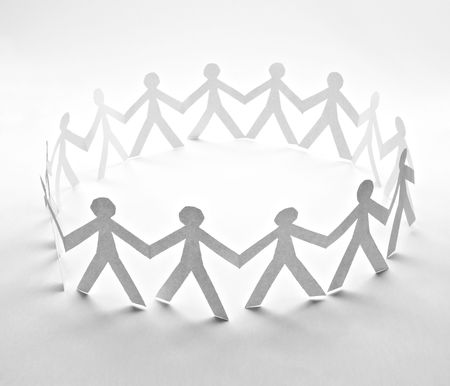 close up of people cut out of paper on white background の写真素材