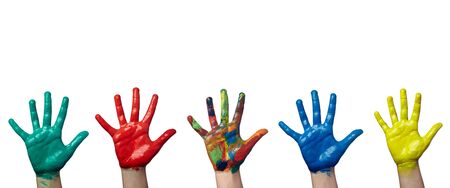close up of child  hands painted with watercolors on white background. each one is in full camera...