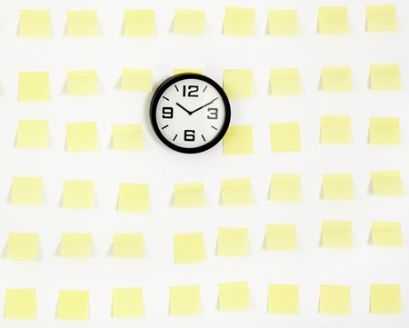 closeup of note papers on office wall