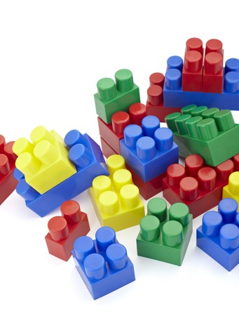 close up of child toy bricks construction on white baclgroundの写真素材
