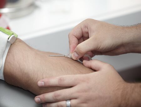 close up of blood extraction in labの写真素材