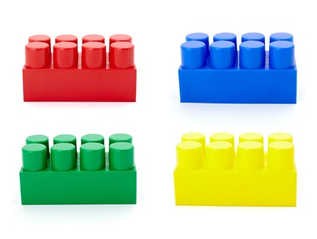 collection of child toy bricks construction on white baclground. each one is in full cameras...