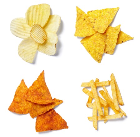 collection of potato chips on whote background. each one is in full camera resolutionの写真素材