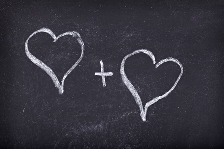 love hearts drawing on a school chalkboardの写真素材