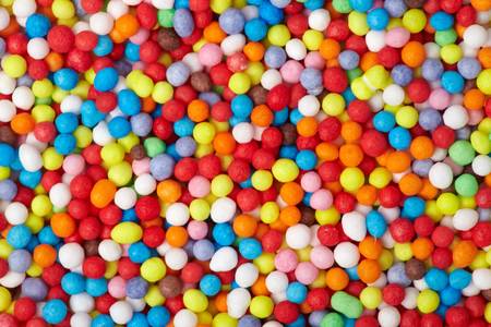 close up of colorful eatable sugar pearls for food decorationの写真素材