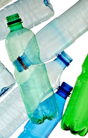 close up of empty used plastic bottles on white background with clipping path
