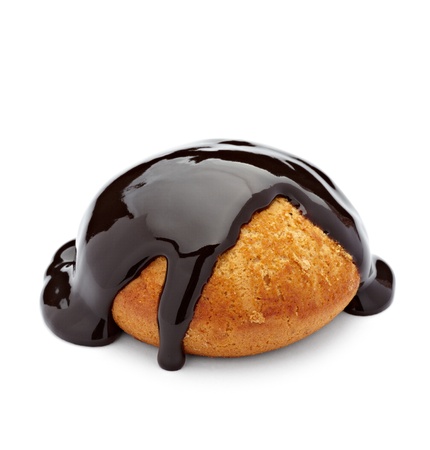 close up of a chocolate syrup on honey cake on white background with clipping path