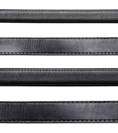 collection of varius  black leather belt on white background. each one is shot separatelyの写真素材