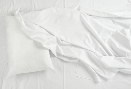 close up of bedding sheets and pillowの写真素材