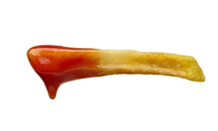 close up of french fries and ketchup on white background