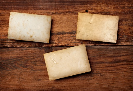 close up of an old photo on a wooden backgroundの写真素材