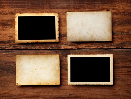 close up of an old photo on a wooden backgroundの写真素材