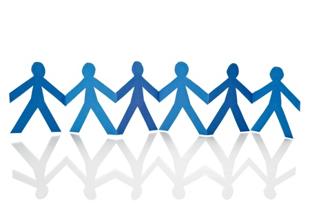 closeup of chain of paper people cut on white backgroundの写真素材