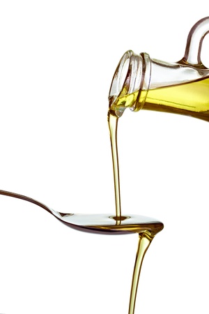 close up of olive oil on white backgroundの写真素材
